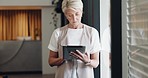 Mature business woman, tablet or window thinking of digital marketing ideas, advertising innovation or calendar management. Manager, ceo or leadership and technology, modern office research or review