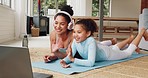 Video call, laptop and mother with girl after exercise, yoga and fitness training together in family home. Communication, love and mom and child wave on video conference on yoga mat after workout