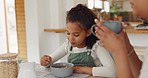 Happy, family and morning communication at breakfast with smile of young kid bonding with mother. Wellness, food and happiness of girl eating cereal at kitchen table with mom in Mexico home.

