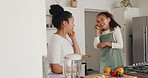 Mother, girl and playing with fruit, banana and dancing in home, having fun and bonding. Love, care and comic, funny and happy mama dance with child holding oranges, fruits or play phone call pretend