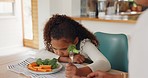 Angry mother, child or girl with vegetables, broccoli or healthy food for nutrition, diet or healthcare wellness in house or home dining room. Grumpy, sulk or irritated mom and kid with food or meal