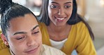 Kiss, love and smile with a diversity couple bonding in the living room of their home together closeup. Relax, kissing and romance with a man and woman spending time in their home on the weekend