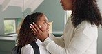 Mother, prepare child for school in the bathroom in a morning care and love routine. Getting ready, mum and daughter being loving, caring and affectionate before educational school 