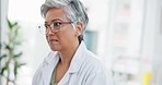 Computer, woman or senior doctor typing medical report information, data research feedback or results. Innovation, glasses or focused mature healthcare worker working on science breakthrough online  