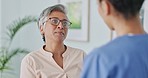 Senior woman, nurse and doctor consultation at a hospital while having conversation about healthcare, health and wellness. Caregiver and old person speaking about nursing home and medical insurance