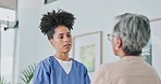 Healthcare, talking and nurse with senior woman in retirement home for checkup, consultation and diagnosis. Wellness, support and medical worker speaking to elderly female patient in nursing home