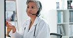 Elderly woman, doctor and telecommunication consulting online advice, report or medical prescription at clinic. Senior female healthcare expert on computer with headset for consultation at hospital