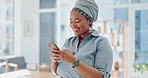 Creative black woman, phone and smile for social media, texting or chatting in startup at office. African American woman employee enjoying online conversation or discussion on smartphone at workplace