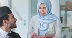 Muslim lawyer man, woman and writing for notes, schedule or court calendar for administration. Legal expert, attorney and receptionist with notebook, islam law or justice strategy at Dubai law firm