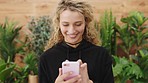 Phone, happy and woman networking on social media, mobile app or the internet with a positive mindset. Happiness, smile and young gen z lady scrolling on a website with a smartphone or technology.
