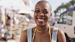 Face, smile and cheerful black woman enjoying summer vacation outside while laughing with joy. Joyful, laugh and portrait of african american female on a sunny holiday or getaway in Cape Town