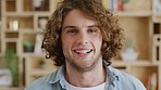 Face, front and male data scientist feeling proud of his web development job in his startup workplace. Portrait, man and analyst working in his creative big data company smiling and happy 