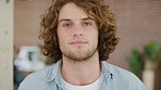 Man, startup office and face in headshot for vision, goal and career as web design entrepreneur. Young business owner, businessman or ceo in portrait by blurred background for success, focus or dream