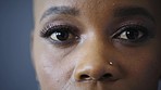 Portrait of serious black woman, eyes and face in awareness of human rights, racism and discrimination in Nigeria. African female closeup with vision for equality, empowerment and feminist revolution