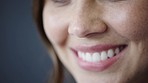 Woman, face or mouth with lips, teeth or invisible braces for healthcare wellness, dental hygiene maintenance or cosmetic treatment. Zoom, smile or happy model with tooth whitening success or texture