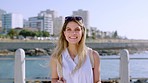 Travel, beach or face of woman on holiday vacation in a city with freedom in summer in Los Angeles. Portrait, smile or happy woman enjoying quality alone time for wellness or mental health outdoors