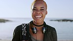 Gen z girl, happy smile and portrait at the beach for freedom, travel and peace on holiday in Bali. Ocean, happiness and hipster black woman by the water at sea during a vacation to relax in summer