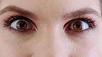 Eyes, woman and macro face with wow, surprised and shocked expression with makeup, cosmetics and and vision to focus. Brown, big eye female alert with omg news about skincare, humanity or lashes
