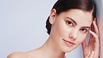 Skincare, face and woman with cosmetics, natural beauty and wellness. Closeup, young female and European lady with makeup, smooth or clear skin for treatment, health or marketing on studio background