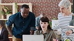 Startup office, business people and team at laptop for online investigation or collaboration while talking, discussion and reading news, report or article. Man and women together at desk for teamwork