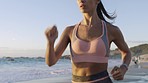 Fitness, woman running and workout on beach in summer sunshine exercise, runner training and sports wellness. Athlete person, speed energy run and cardio motivation on ocean sand outdoor in Sydney