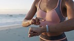 Beach, running and woman smartwatch for fitness speed, progress or health monitor on digital technology. Sports data of a runner or athlete training, workout or exercise with smart watch timer by sea