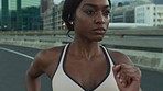 Running, music and city with a sports black woman outdoor for fitness, exercise or a cardio workout. Health, wellness and training with a female runner or athlete streaming audio while out for a run