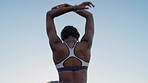 Fitness, health and back of black woman stretching arms getting ready for workout. Sports, training and female warm up, prepare or stretch outdoors for running, exercise jog or cardio for wellness.