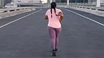 Fitness, freedom and black woman running in city street for health and weight loss. Exercise, motivation and plus size woman runner training in cardio, strength and body care on healthy urban workout
