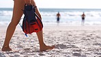 Diving, woman and walking on beach sand for summer vacation, freedom or travel adventure. Closeup girl with scuba diving equipment, snorkel and flippers at sea, sunshine or swimming in tropical ocean