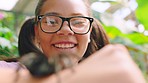 Happy, nature and girl face with spider on arm for education, learning and comic or fun on school zoo trip. Smile, wildlife or zoom of student child excited for danger, creepy and exotic pet on hand