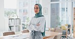 Muslim executive, woman and face with arms crossed in office for vision, success and goal in web design startup. Islamic business leader, mission and focus with goals, dream and innovation in Dubai