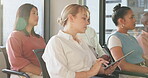 Tablet, notes or business woman learning at a trade show, conference or seminar event for startup management advice. Crowd, audience or business people listening to a speaker for financial knowledge