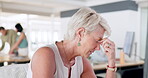 Stress, headache and senior business woman in office feeling pain, migraine or sick. Burnout, anxiety and tired, fatigue or exhausted elderly female employee with depression in corporate workplace.