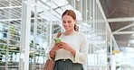 Woman, phone and walking while online for communication, chat or notification at a shopping mall after work while using mobile app for banking. Female on smartphone to with wifi for social network 
