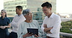 Tablet, businessman and senior manager on a rooftop planning a digital strategy for online target audience. Teamwork, diversity or woman in leadership talking, coaching or speaking to Japanese worker