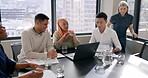 Business people, meeting and laptop planning digital strategy, website design or company marketing of diversity teamwork. Leadership, manager and employees in office, brainstorming online technology