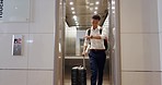 Elevator, travel and watch with a business asian man in an airport, checking the time of his flight for departure. Door, floor and late with a male employee holding suitcase luggage while traveling