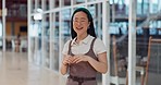Face, heart and business woman with hand sign in office building, smile and happy for startup success. Asian girl, hand and emoji icon by excited business owner smiling for company vision in Japan