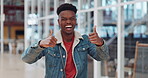 Thumbs up, black man and celebrate success in trendy startup, marketing agency and motivation for winning, goals and agreement. Happy worker, hipster and guy thumb up in support, trust and hand emoji