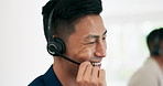 Call center, smile and asian man consulting in virtual communication, support and service with telemarketing sales success. Happy telecom, technology advisor and customer care worker in business chat