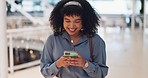 Phone, smile and black woman in a shopping mall reading social media, web and mobile internet text. Happy online communication, online shopping and mobile phone webpage sale of a woman on a app