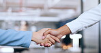 Corporate, partnership and b2b handshake of business people for professional agreement together. Cooperation, welcome or thank you of interracial women employees shaking hands in workplace.