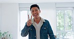 Thumbs up, peace hands and Asian man with a wink, cool creative and face of an entrepreneur at an agency for work. Smile, winning and portrait of a designer with happiness, confidence and proud