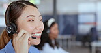 Call center, customer support and sales with an asian woman consultant working on a headset in her office. Contact us, ecommerce and retail with a female employee consulting on a call at work
