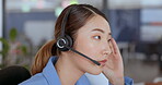 Frustrated, tired and call center woman in Seoul with client problem solving for ecommerce, website or technology support. Stress, headache and angry asian or virtual customer care worker consulting