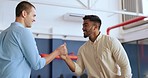 Creative, businessman and friends in handshake for greeting, introduction or partnership at the office. Man shaking hands with work colleague in thank you, welcome or agreement deal for startup