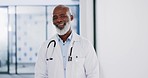 Healthcare, doctor and face of black man in hospital, health facility and clinic for trust, support and help. Insurance, medical care and portrait of senior medical worker with smile for consulting