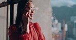 Asian woman, business and phone call at window in office building with communication, networking and mobile negotiation in startup. Female entrepreneur talking on smartphone with cityscape China view