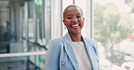 Face, portrait of black woman employee in an office building with a happy smile, vision or goals for success. Business office, leadership or marketing manager with pride, growth mindset or experience